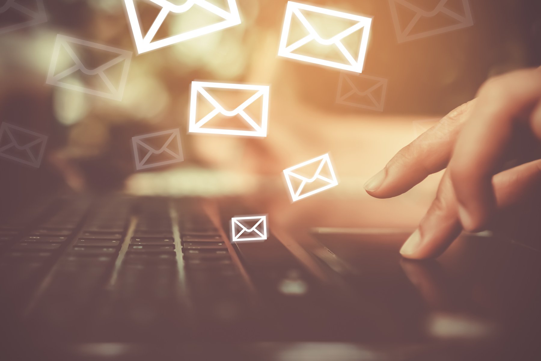 Woman hand using smartphone to send and recieve email.